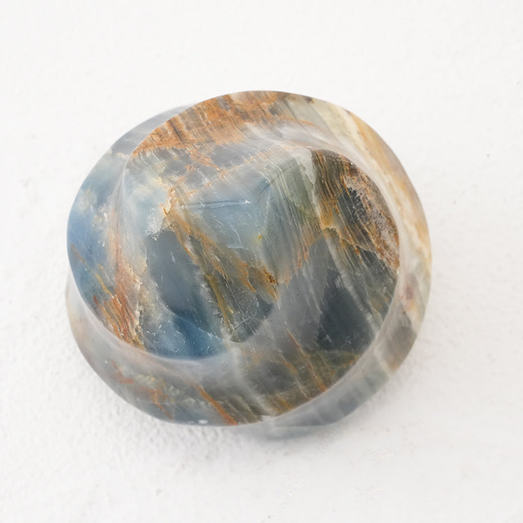 Close-up of blue onyx flame showing its vibrant blue hues and flame-like shape.