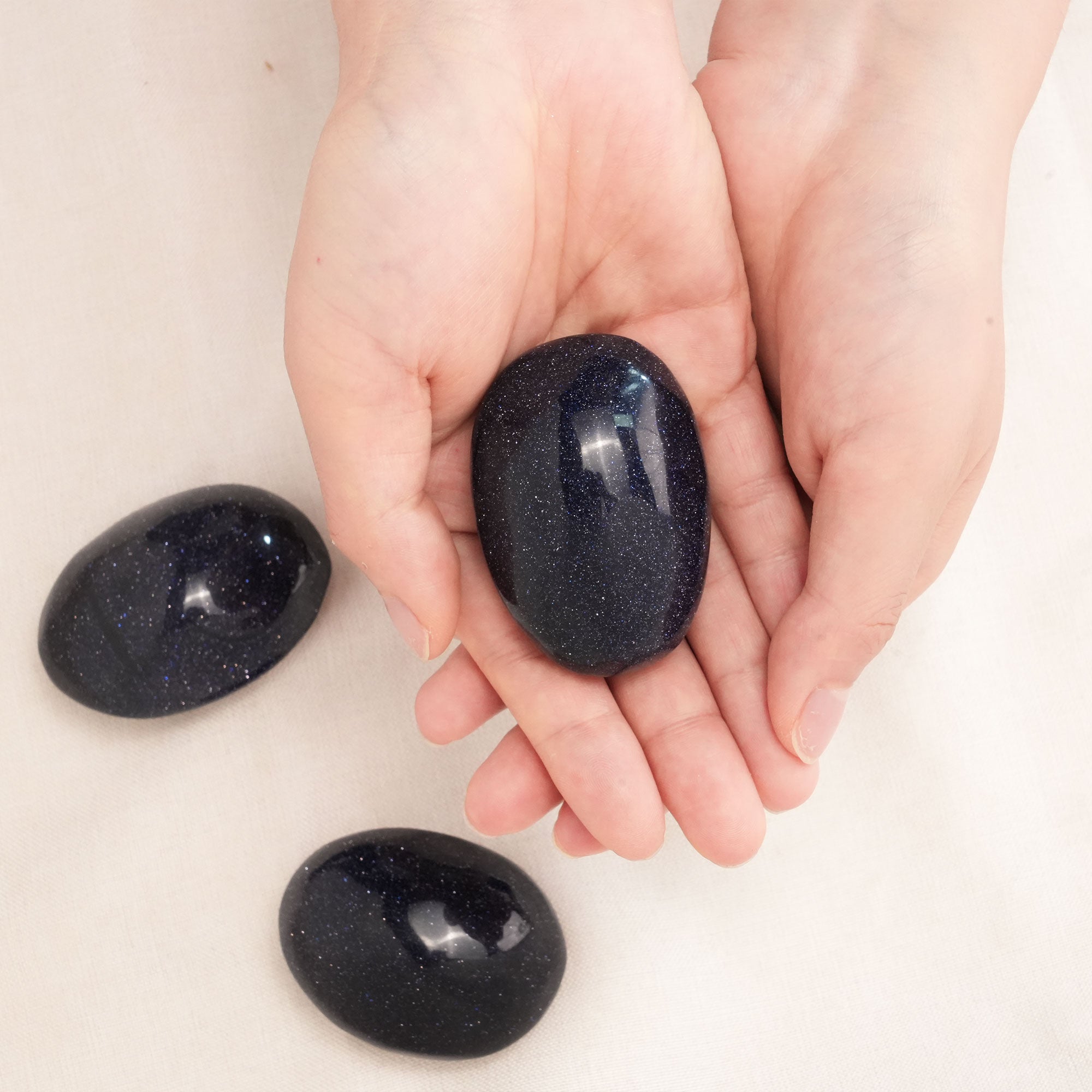 Natural Blue Sand Stone Palm Stone promoting positive energy and mental clarity