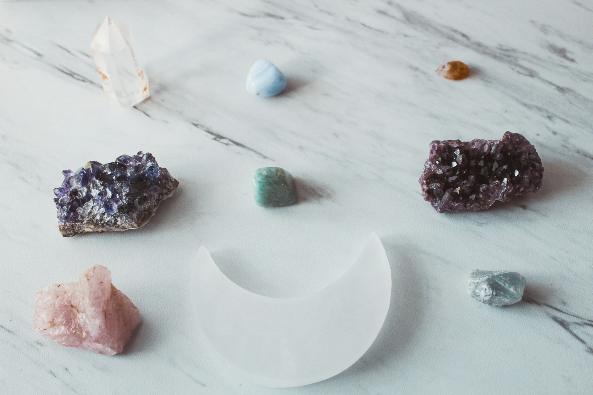 Clear Quartz and Amethyst Crystal Healing Set promoting energy cleansing and positive vibes