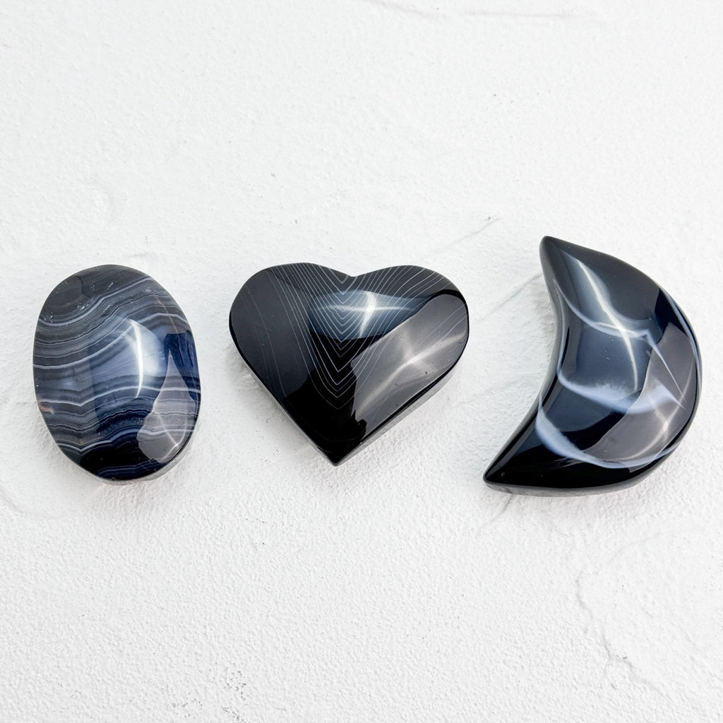 Black Lace Agate Heart/Moon Palmstone with intricate patterns