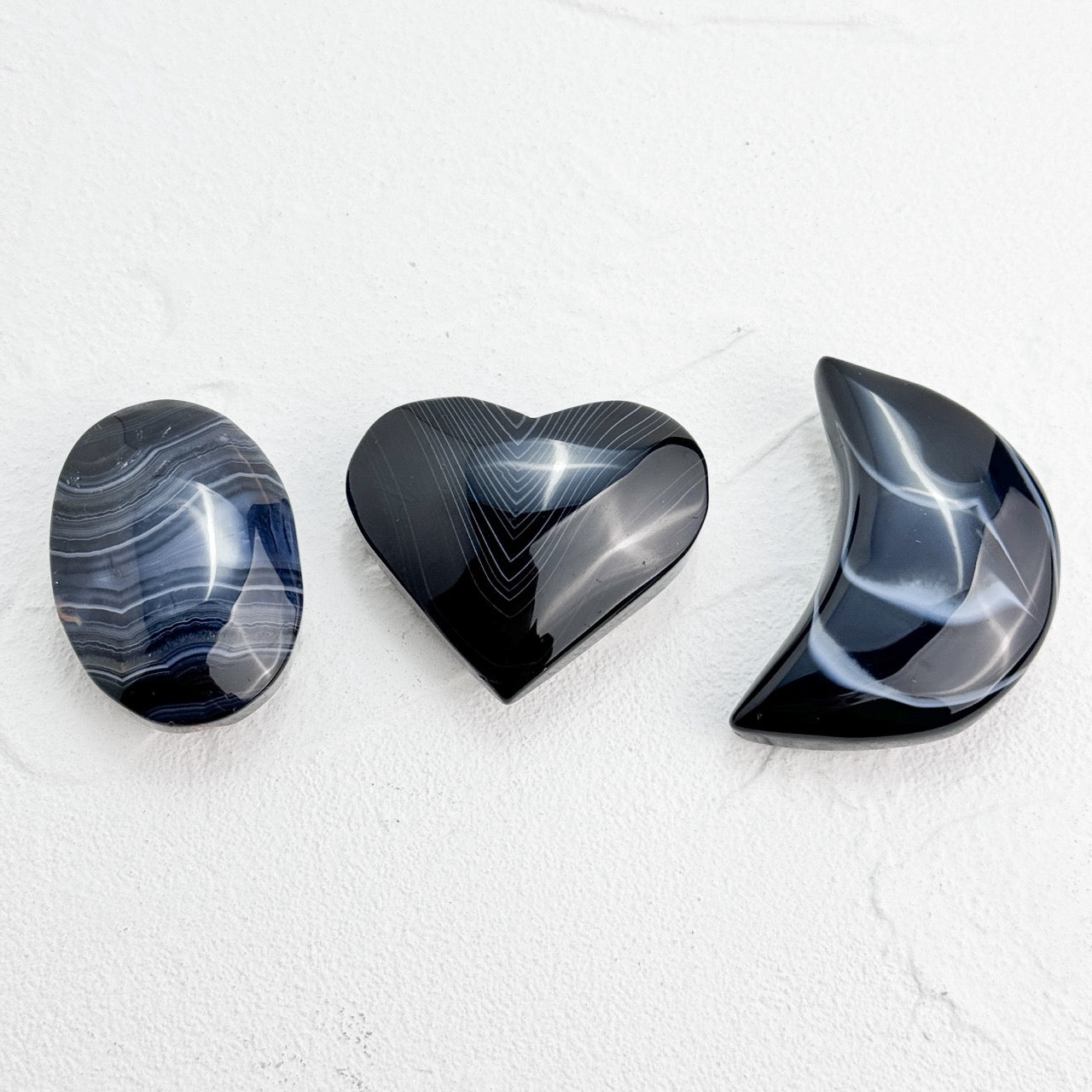 Black Lace Agate Heart/Moon Palmstone with intricate patterns