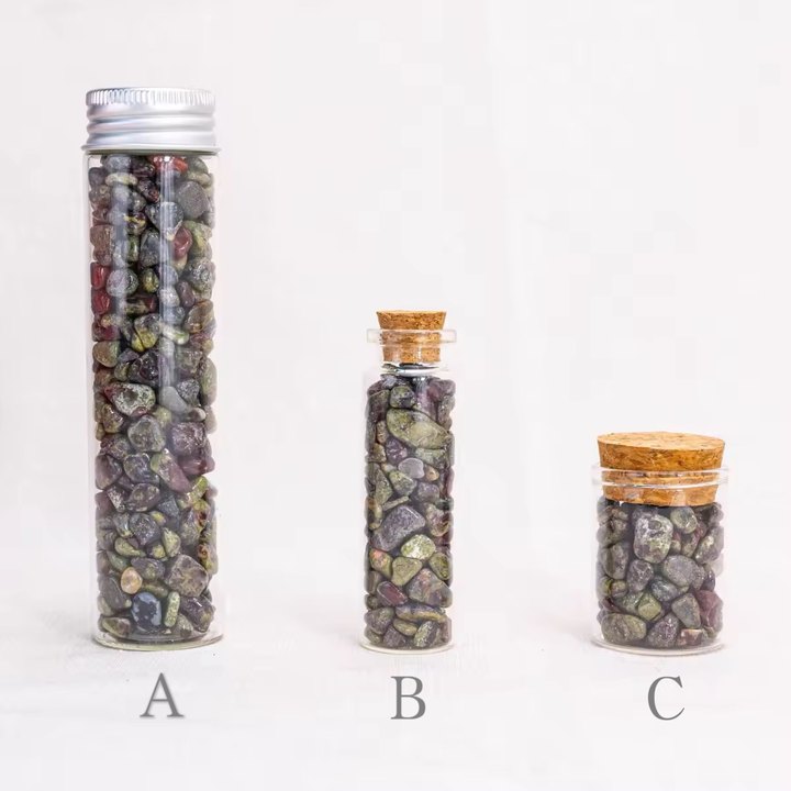 These green-red Dragon Blood Stone Chips enhance courage and strength.