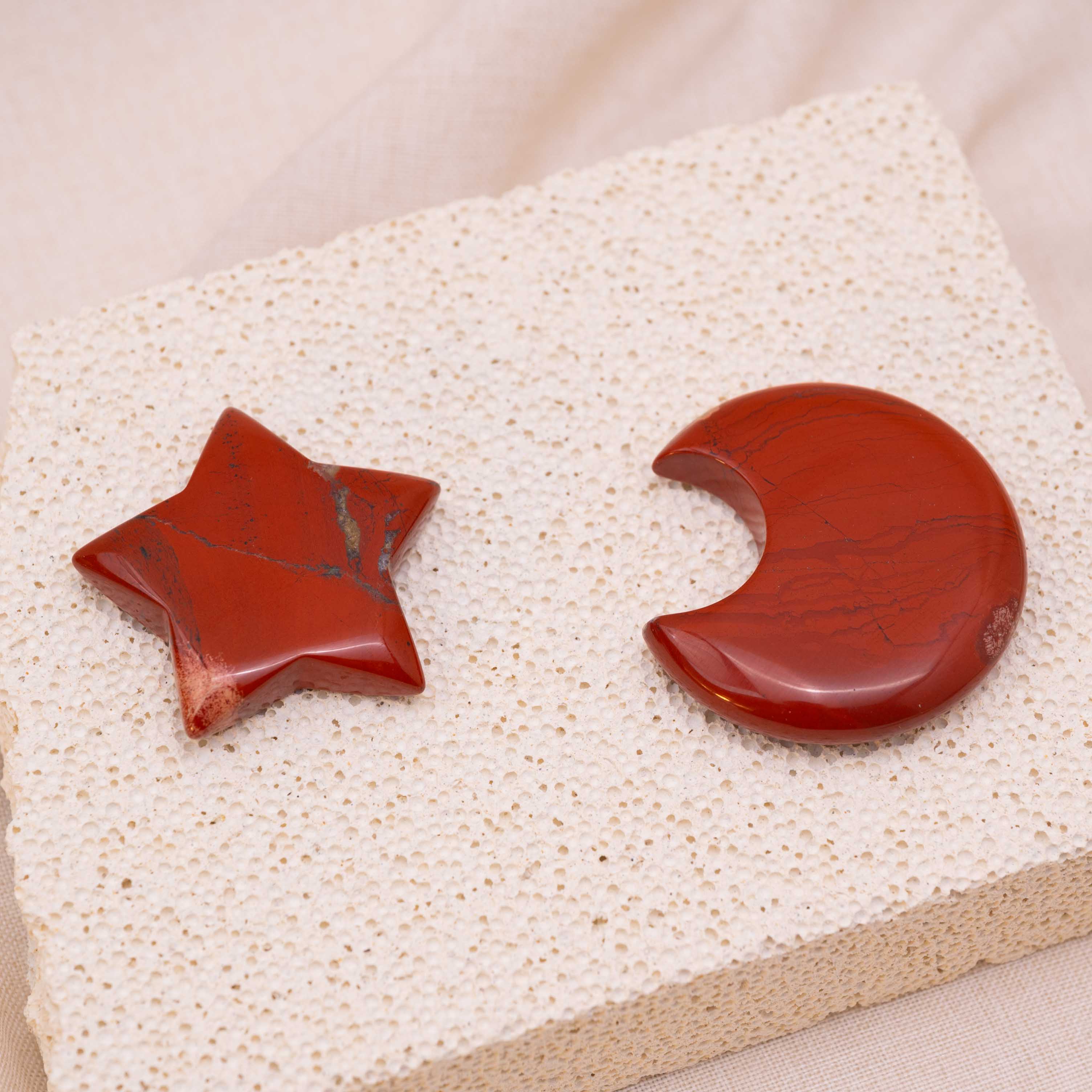 Close-up of Red Jasper Star/Moon Palm Stone