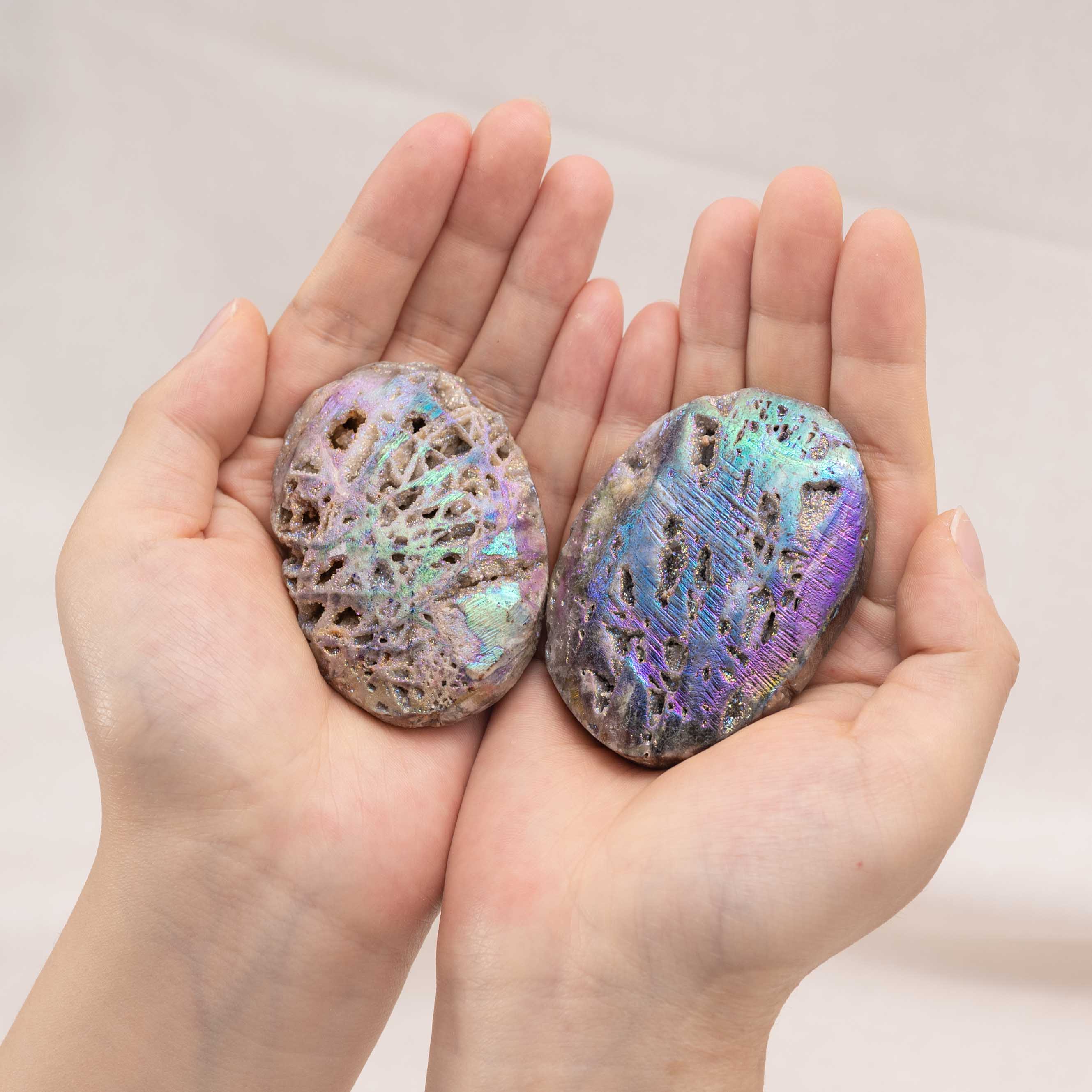 Vibrant and shiny Aura Sphalerite Palm Stone with rainbow-like surface