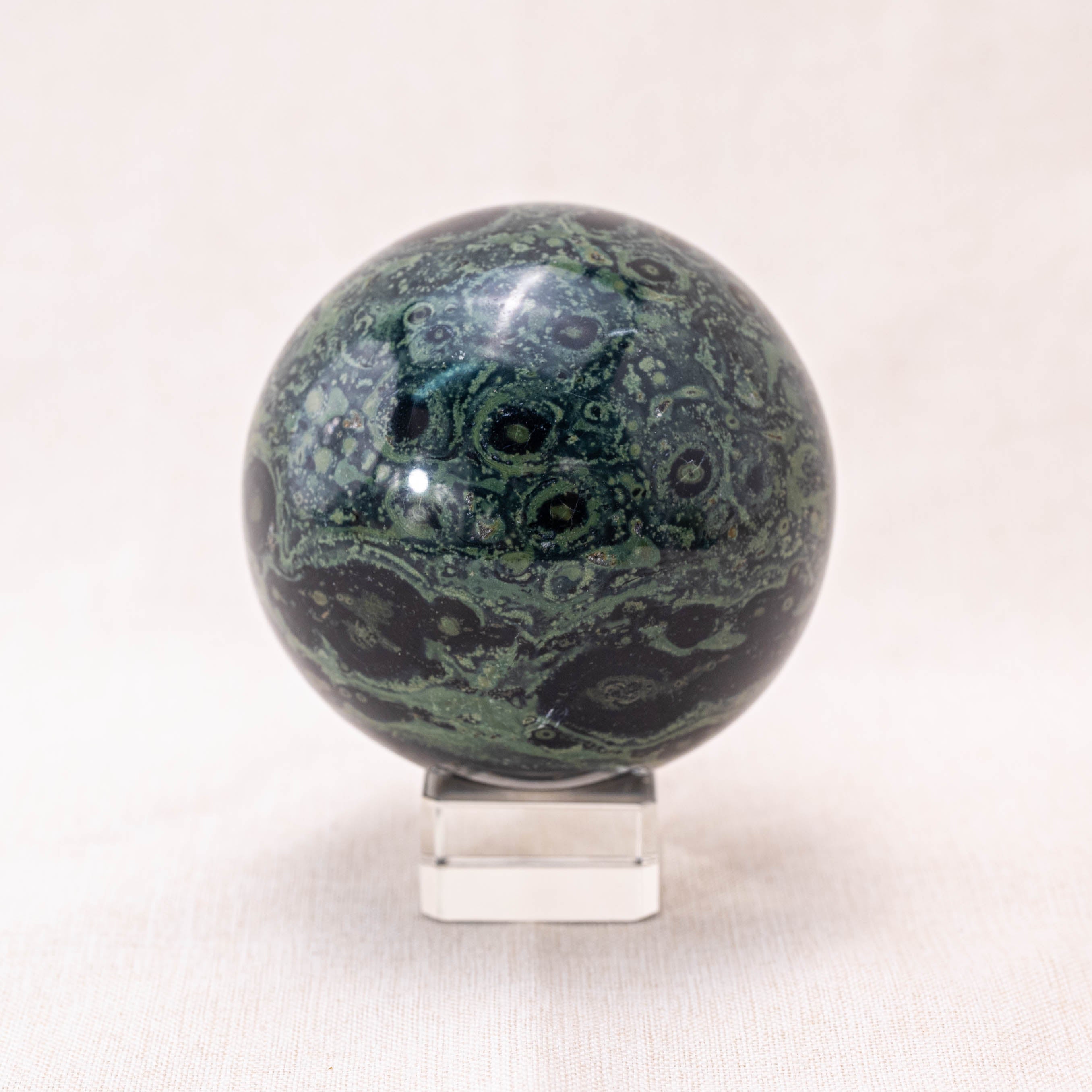 Kambaba Jasper Sphere with swirling green and black patterns