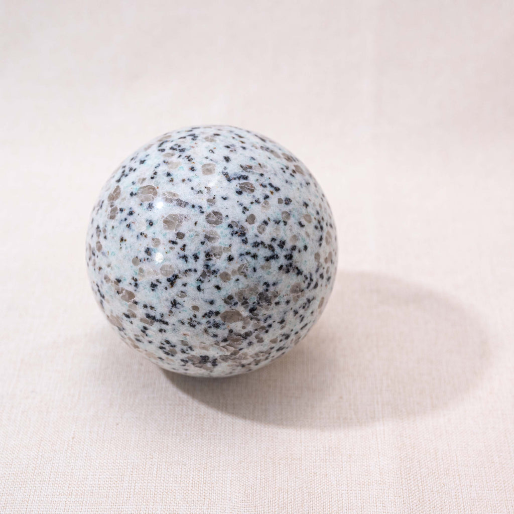 Kiwi Jasper Sphere, a versatile crystal for meditation and relaxation.