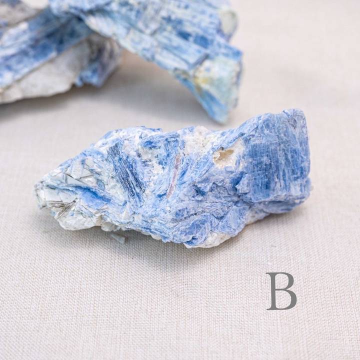 Unpolished kyanite stones help balance the chakras