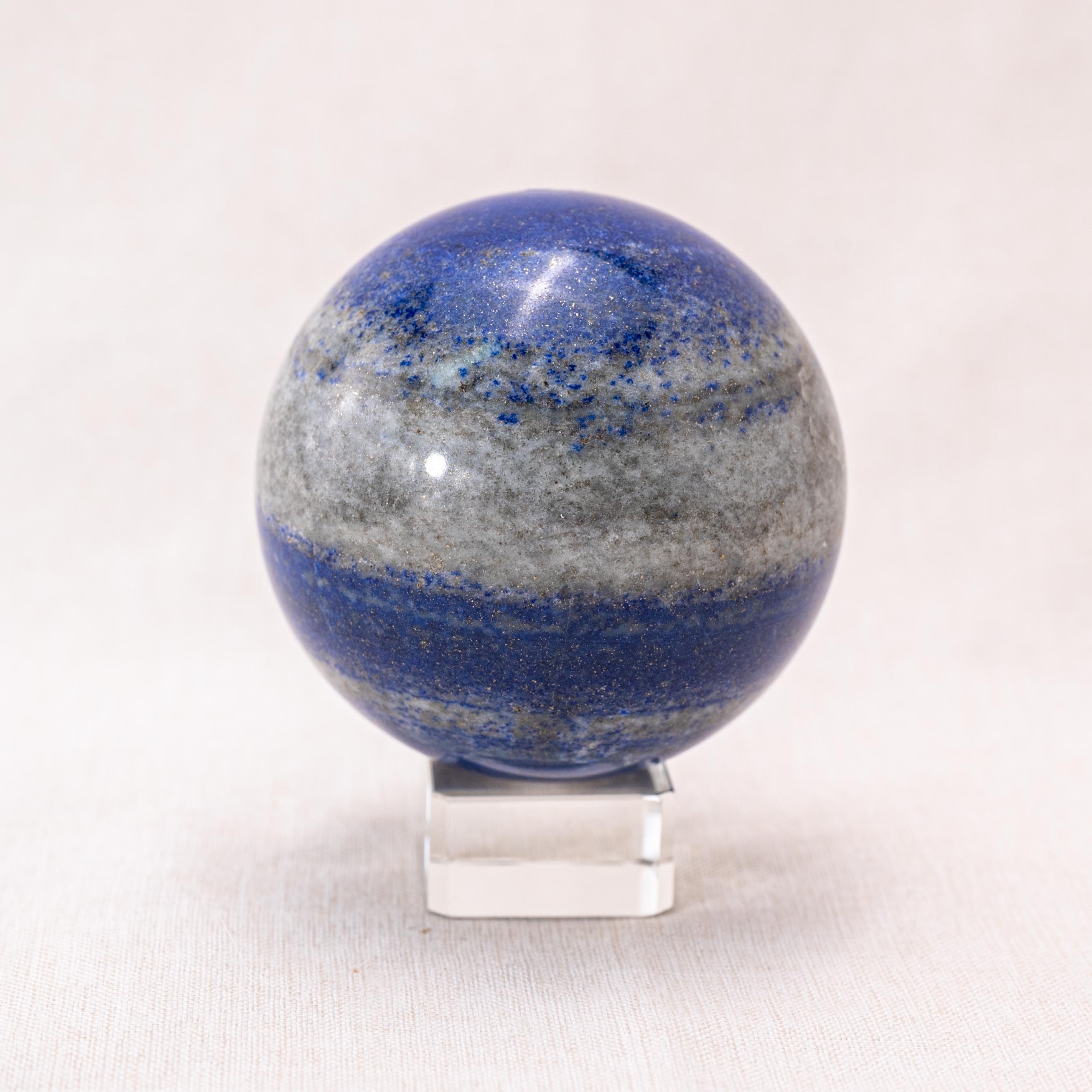 Spiritual clarity lapis lazuli sphere, enhancing intellectual abilities and honest communication.