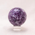 The Lepidolite Sphere serves as a healing crystal.