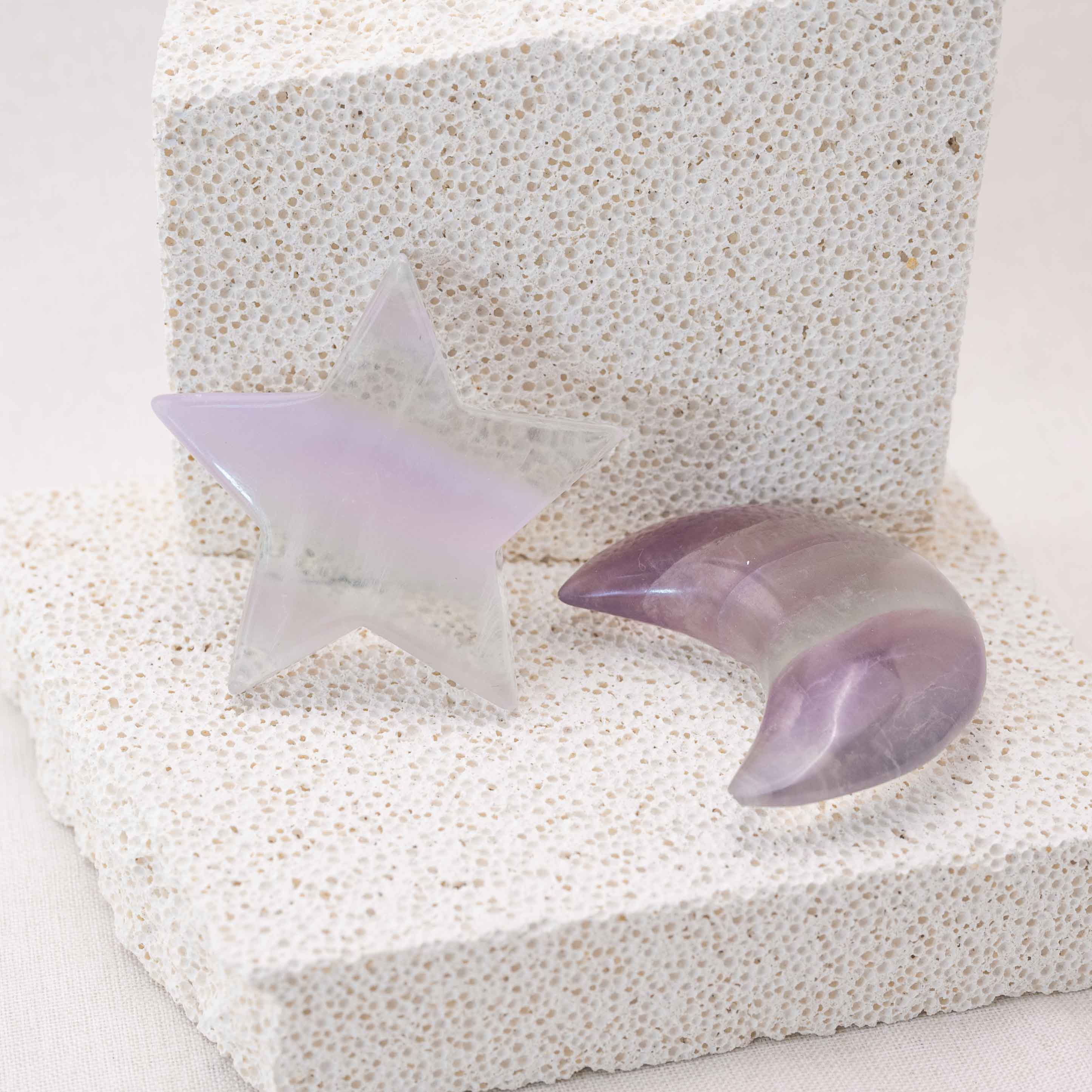 light-purple fluorite star moon palm stone