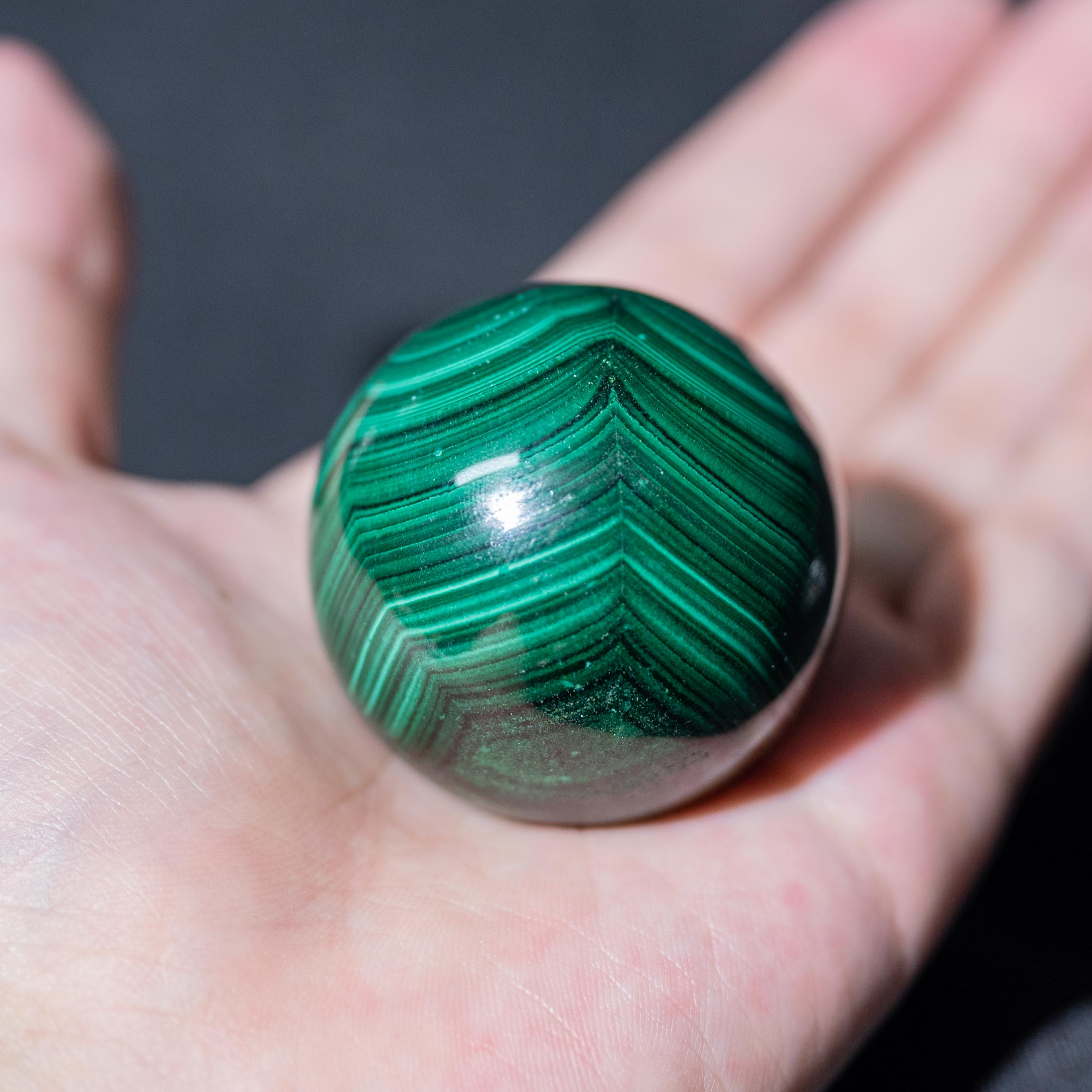 This Malachite Sphere absorbs negative energies and radiates positive vibrations.