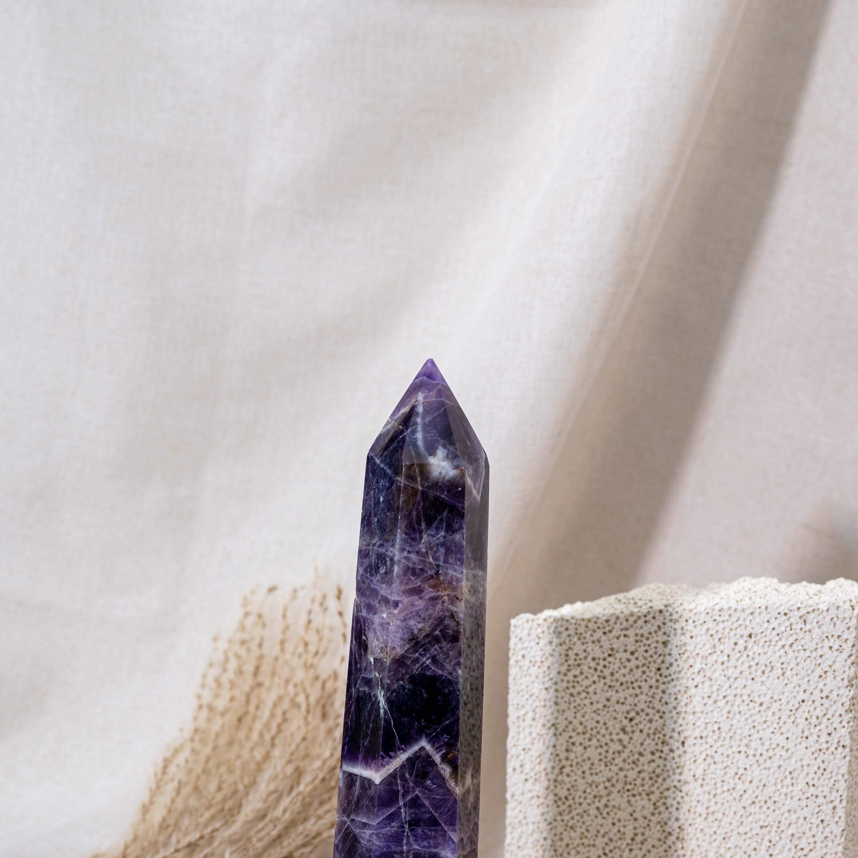 With its striking appearance, the Dream Amethyst Tower serves as both a decorative piece and a powerful healing tool