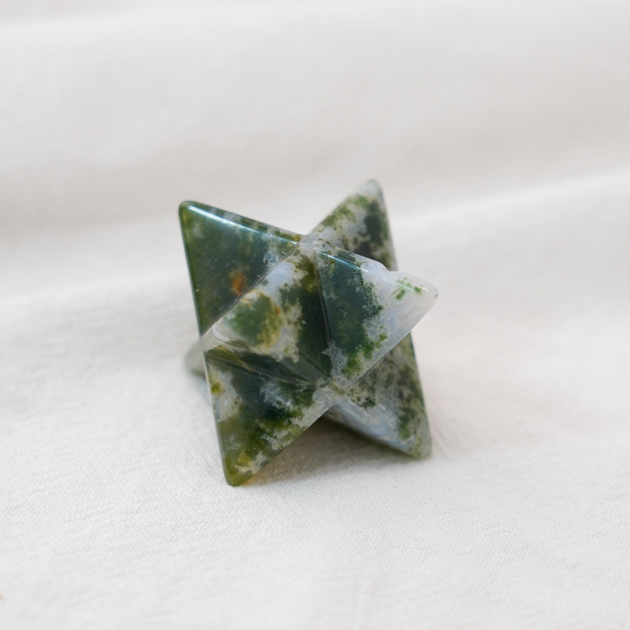 Moss Agate Merkaba with natural green hues, ideal for energy healing