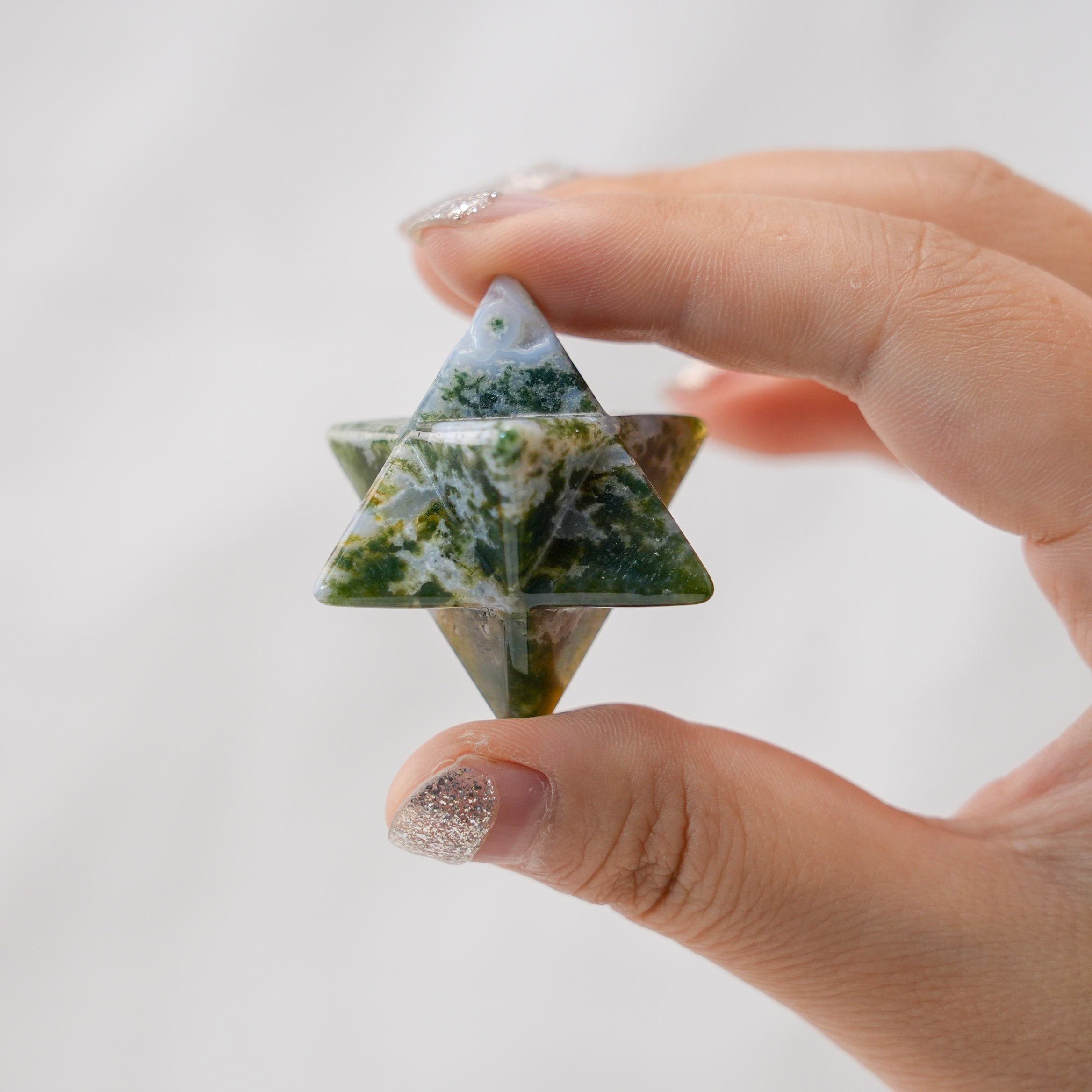 Elegant Moss Agate Merkaba promoting connection to nature and inner peace