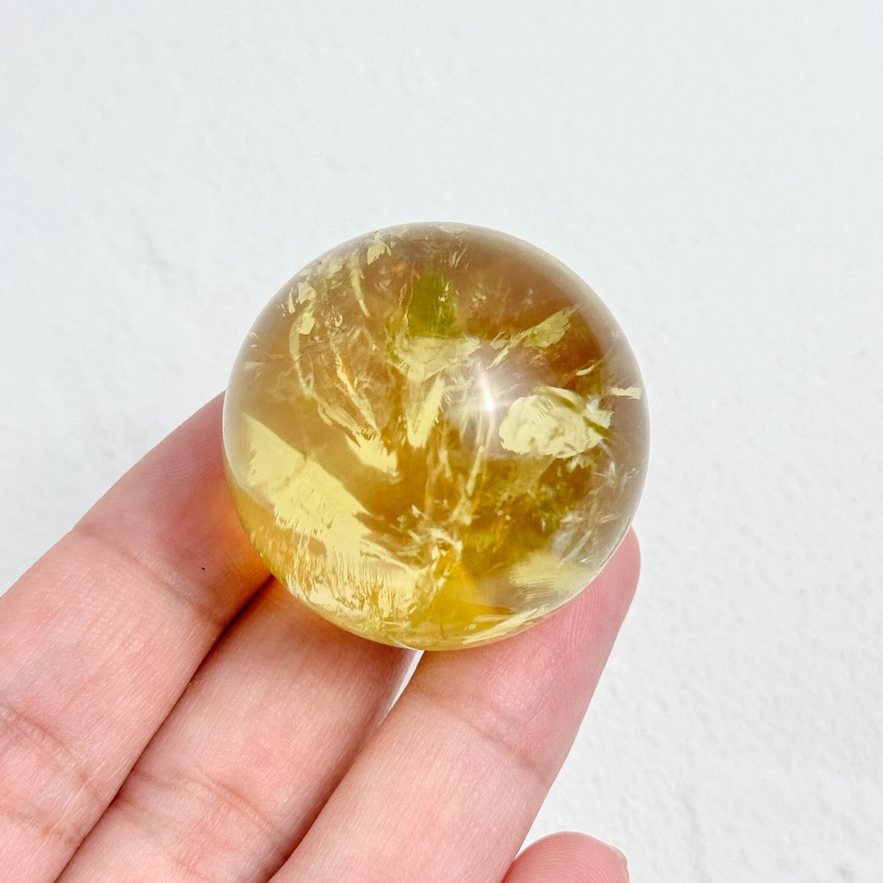 Decorative citrine crystal ball enhancing a modern home office