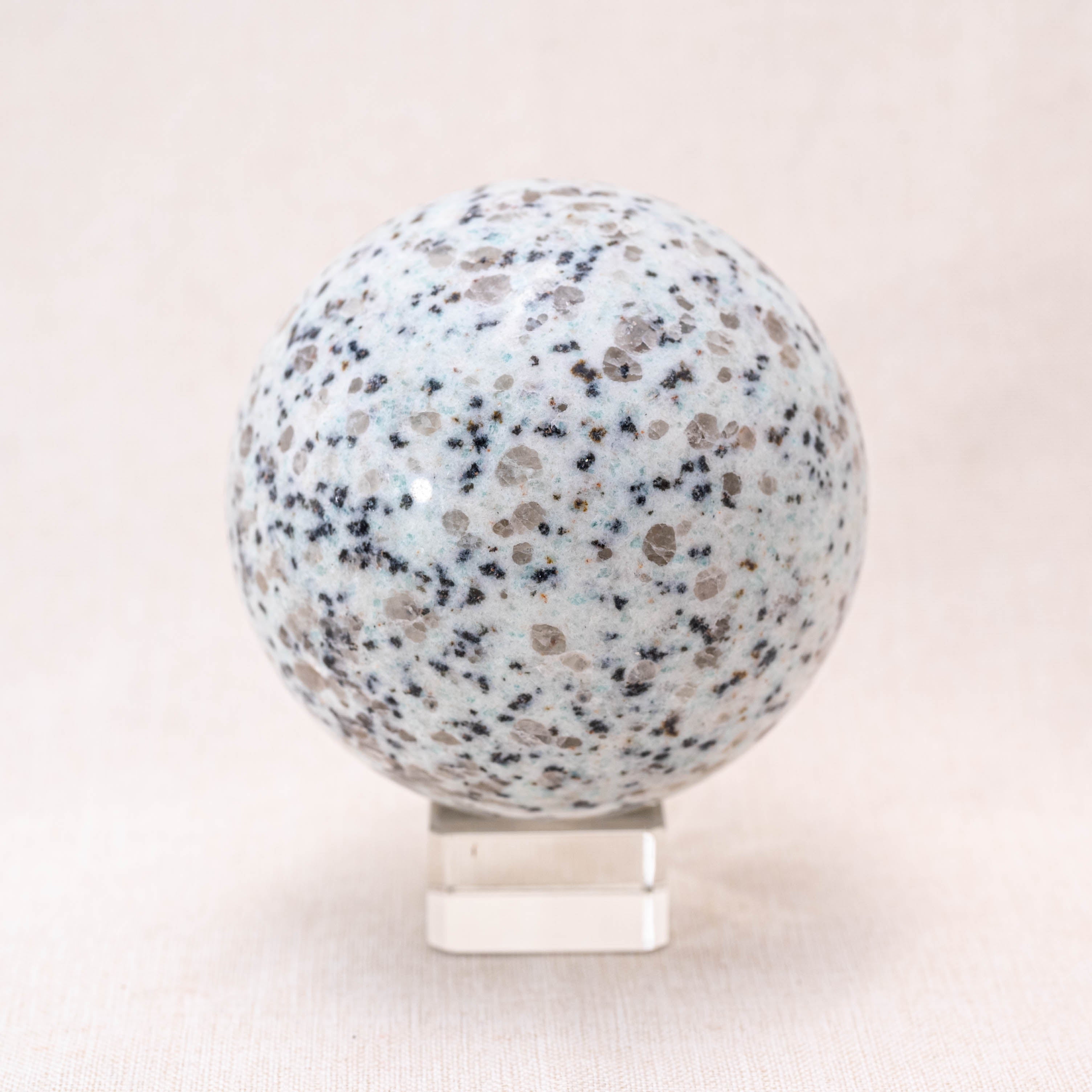 Natural Kiwi Jasper Sphere, ideal for meditation and home decor.