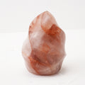 Macro photograph of red fire quartz flame highlighting its rich red color and unique flame shape.