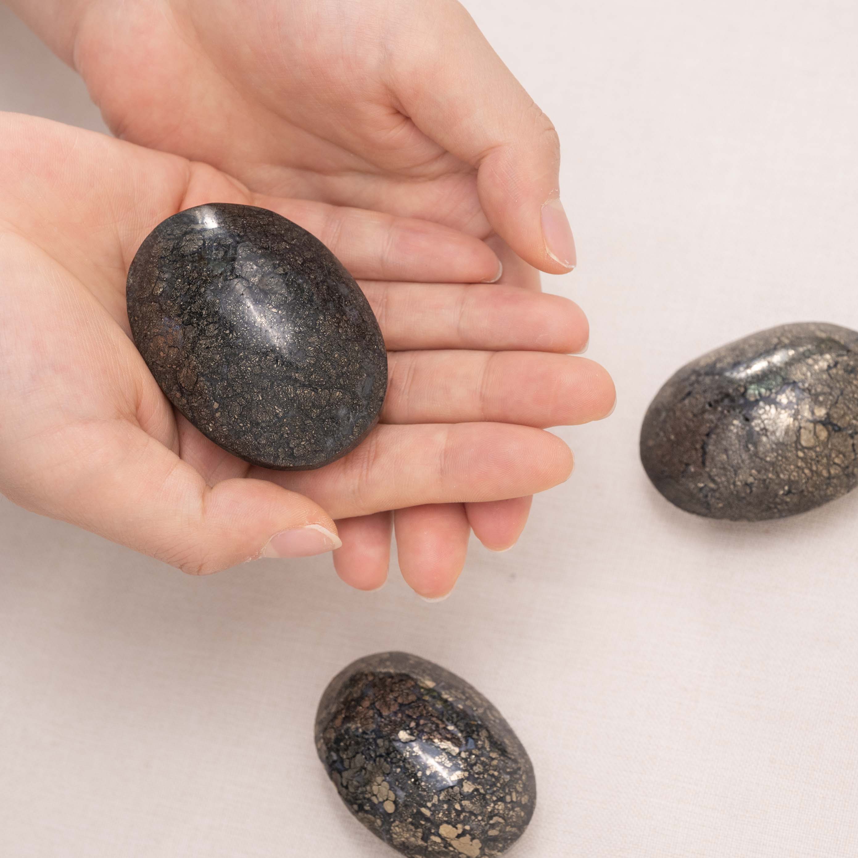 Hand-polished Marcasite Agate Palm Stone, perfect for enhancing tranquility