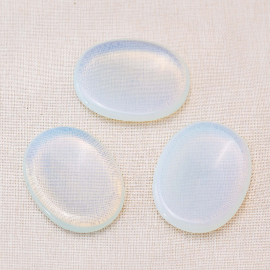 Use the Opalite Worry Stone to maintain a positive outlook