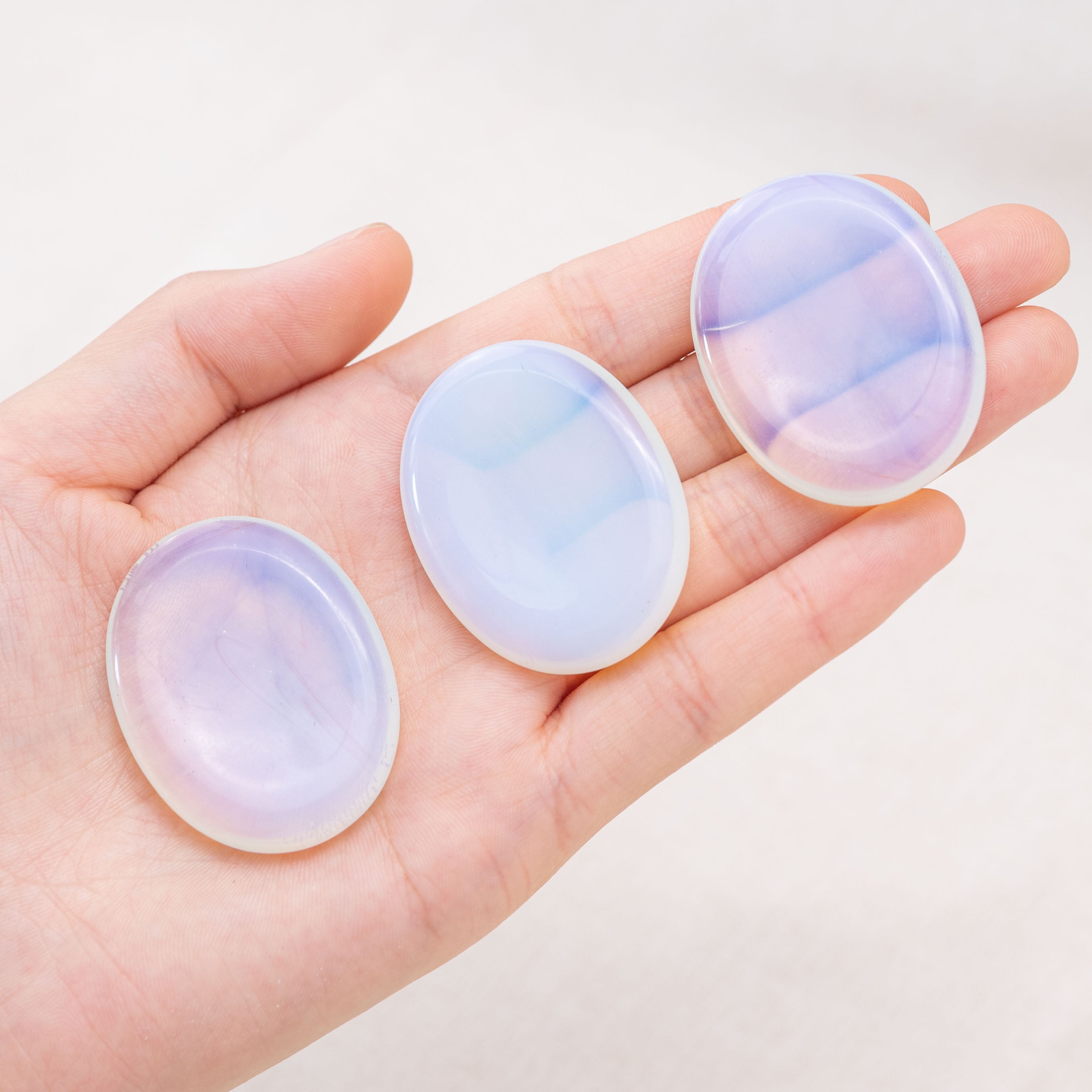 Enhance self-esteem with the Opalite Worry Stone, promoting confidence and clarity