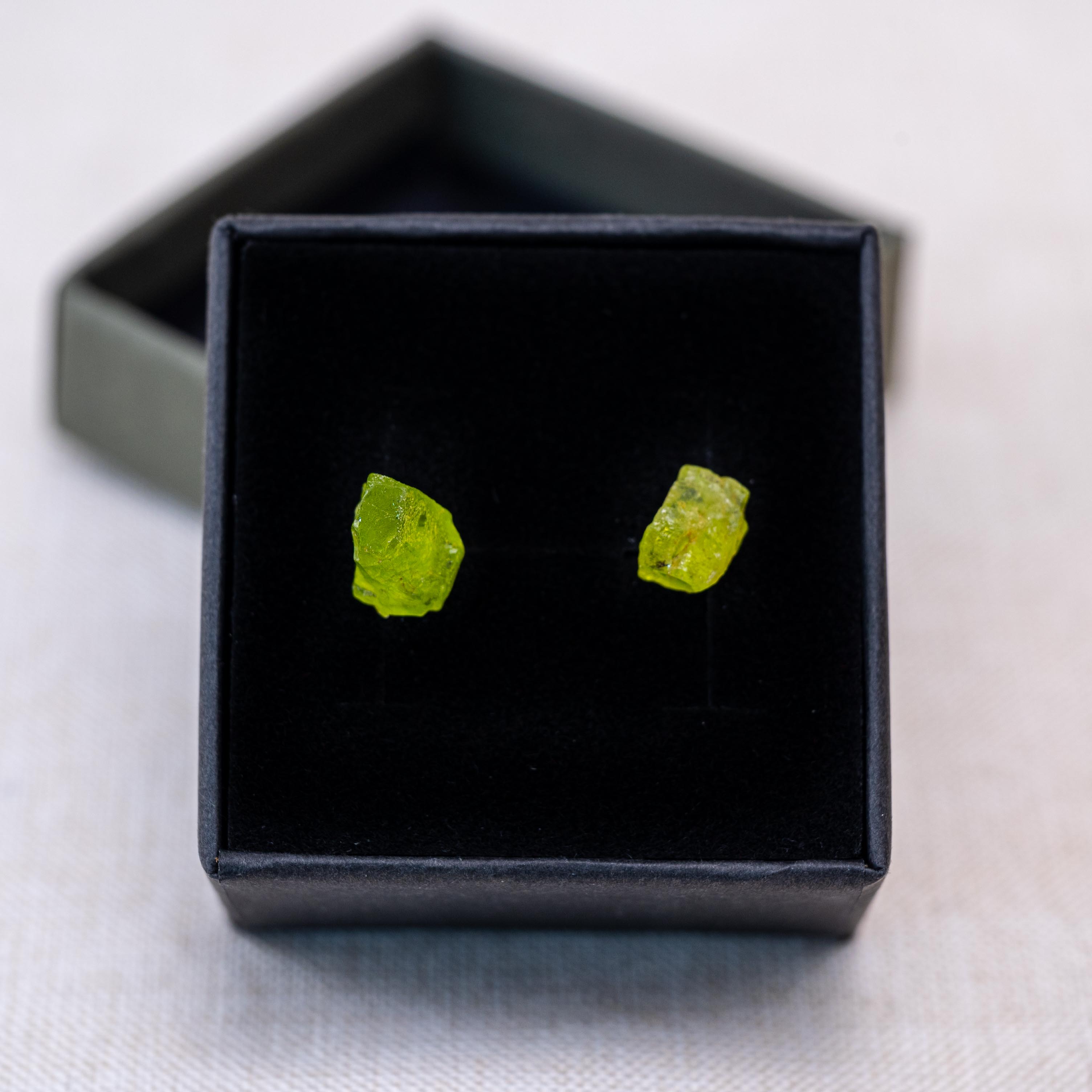 These vibrant earrings promote healing, renewal, and emotional balance.