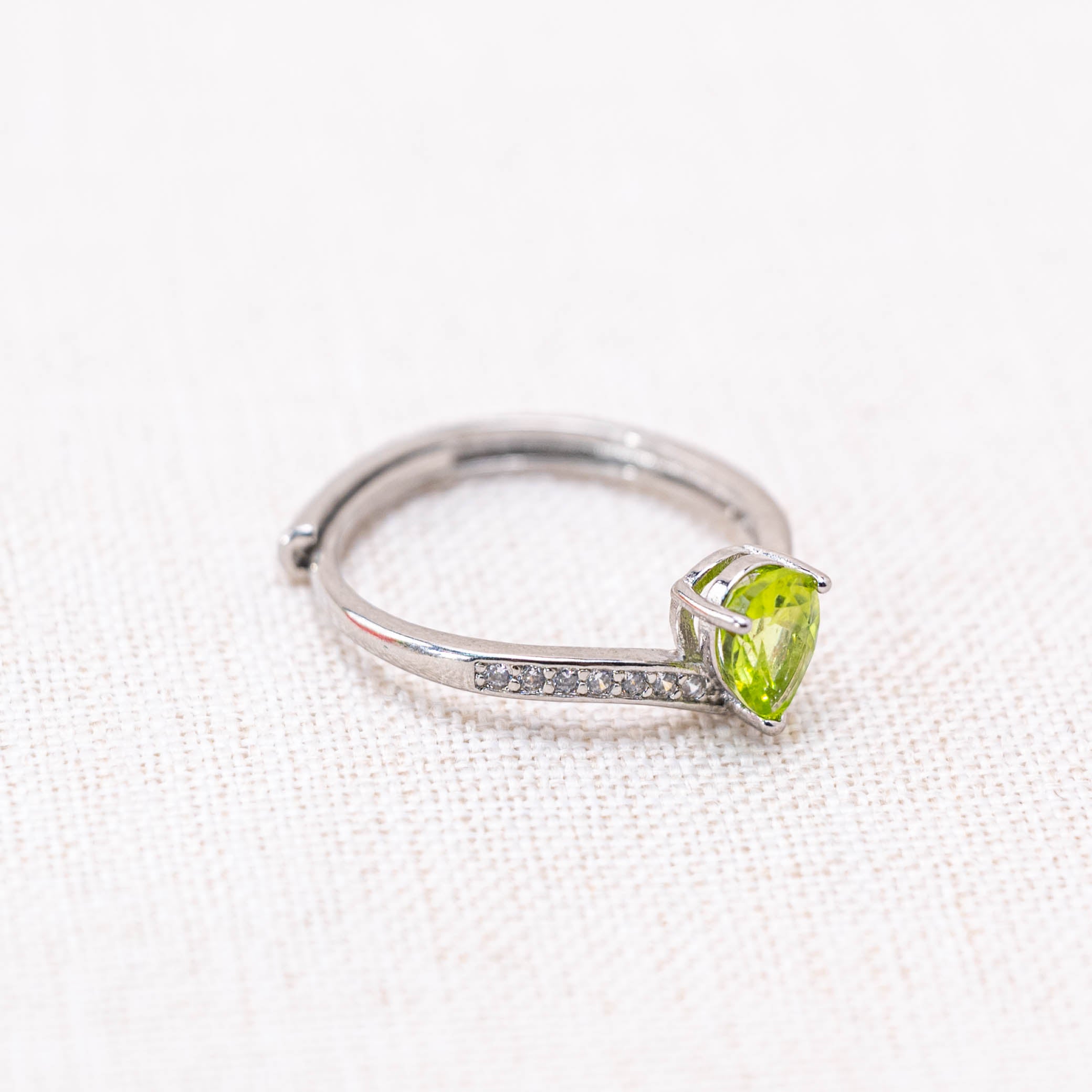 Peridot Teardrop Ring, symbolizing renewal.