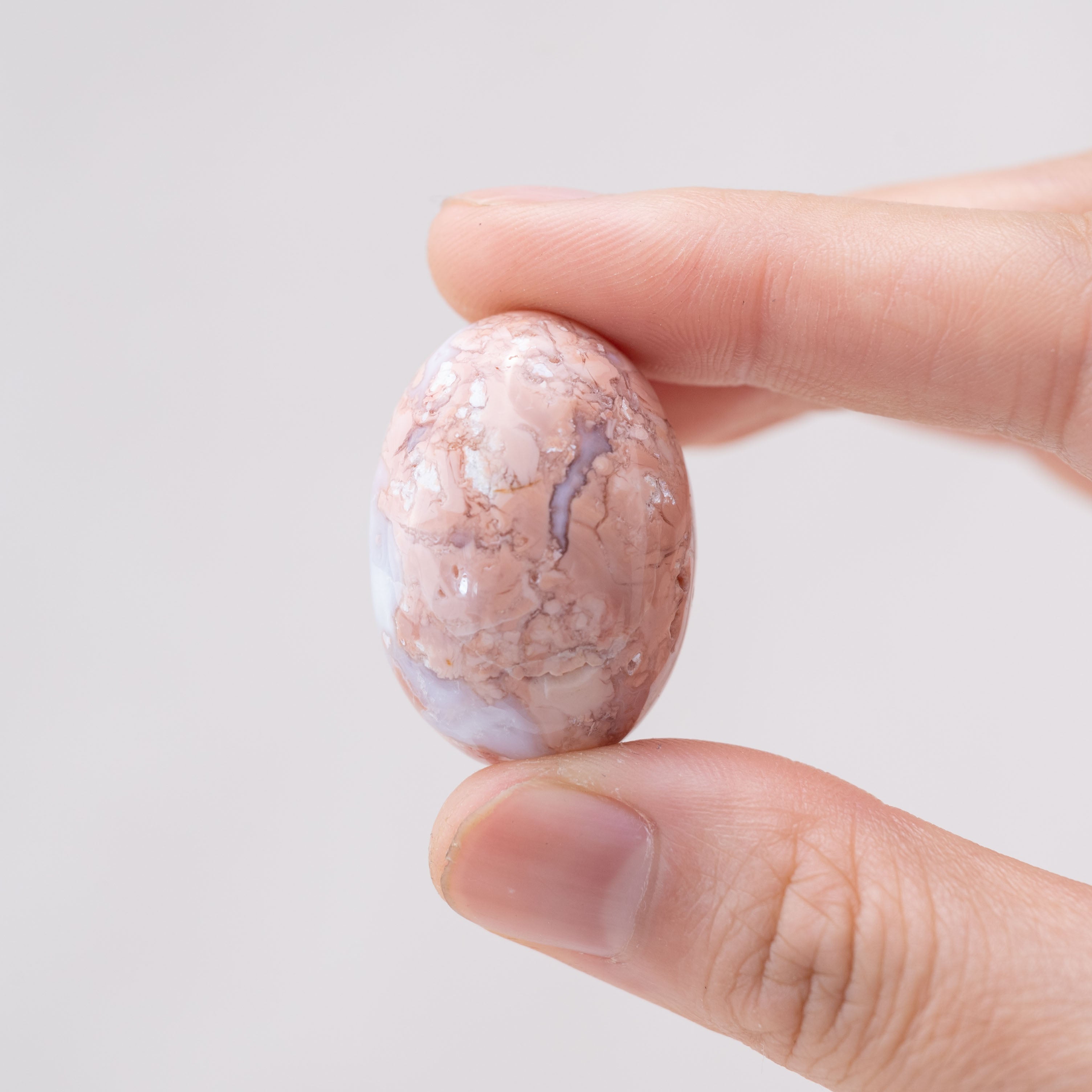 Laid-out Petal Agate tumbled stones for harmony and growth
