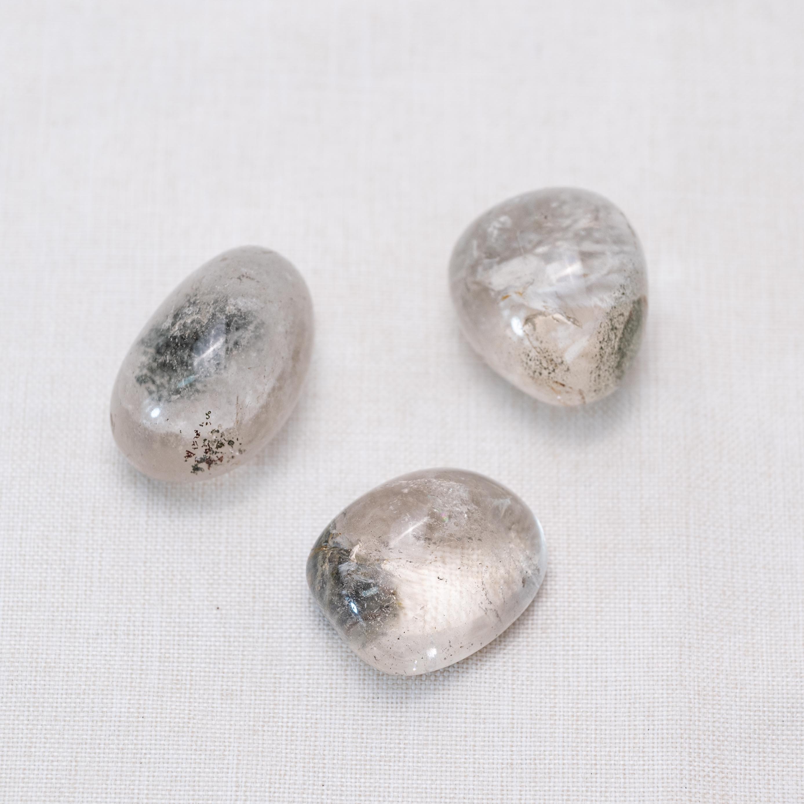 Close-up of Phantom Quartz tumbled stone's unique inclusions