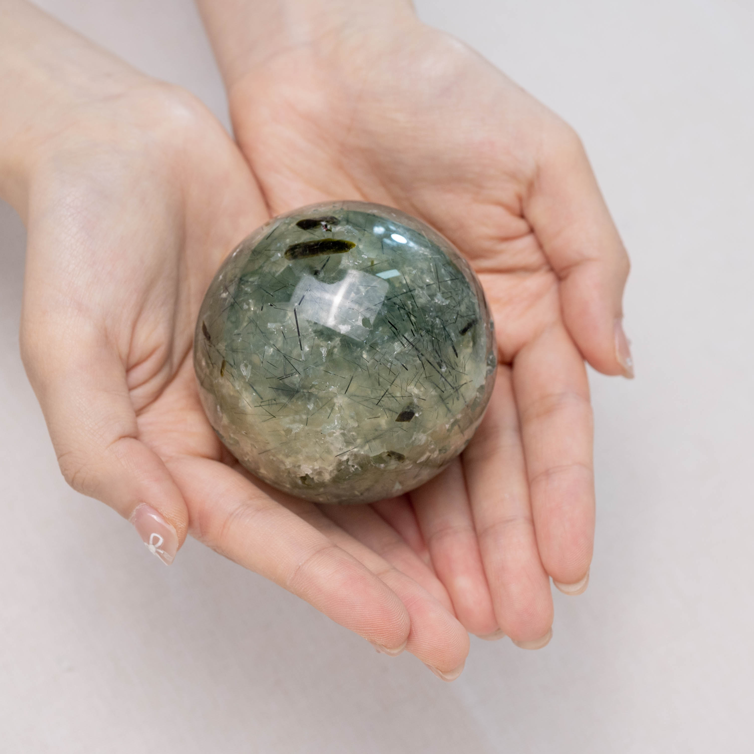 Hand-polished Prehnite Sphere for meditation
