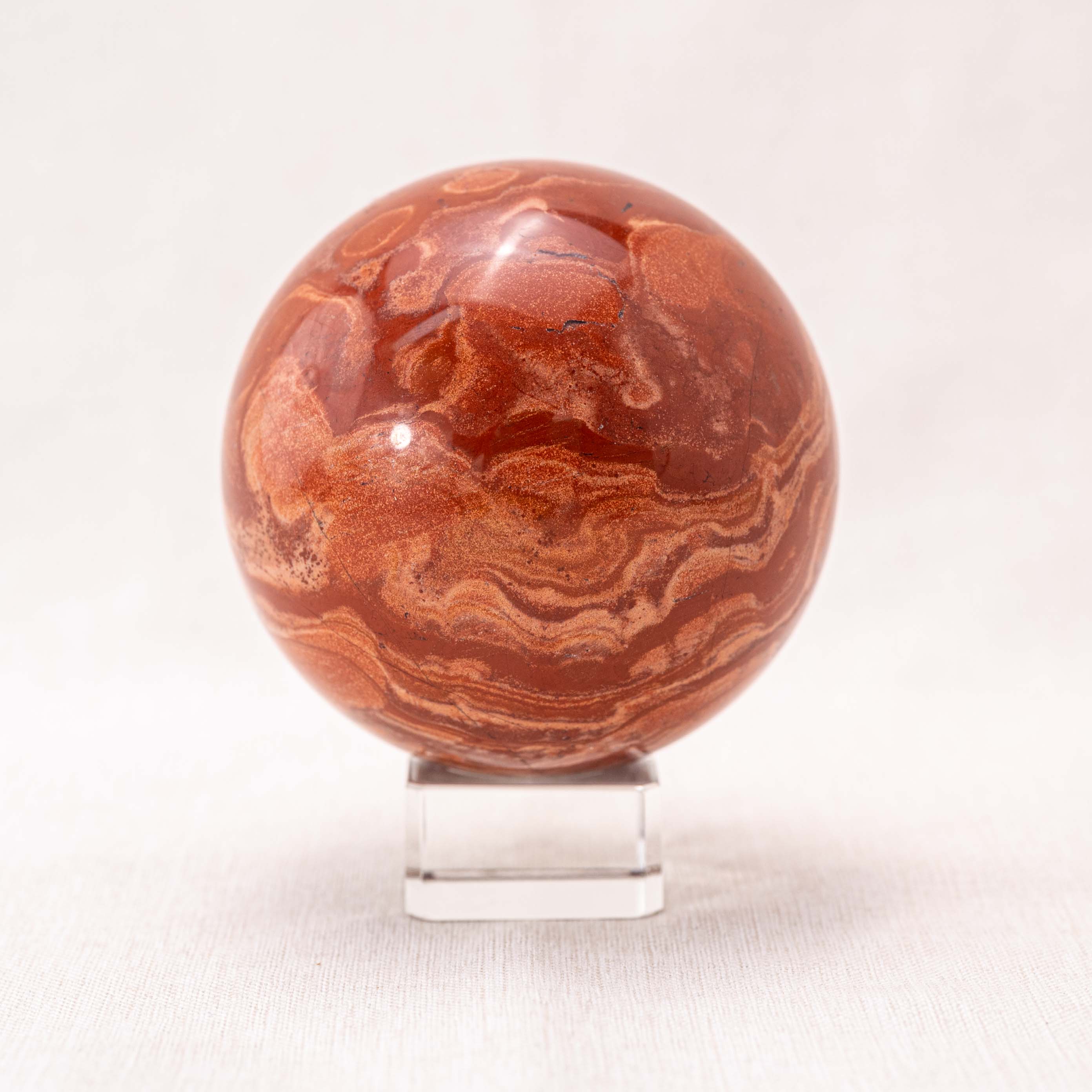 Beautifully polished Red Jasper Sphere ideal for meditation and chakra healing.