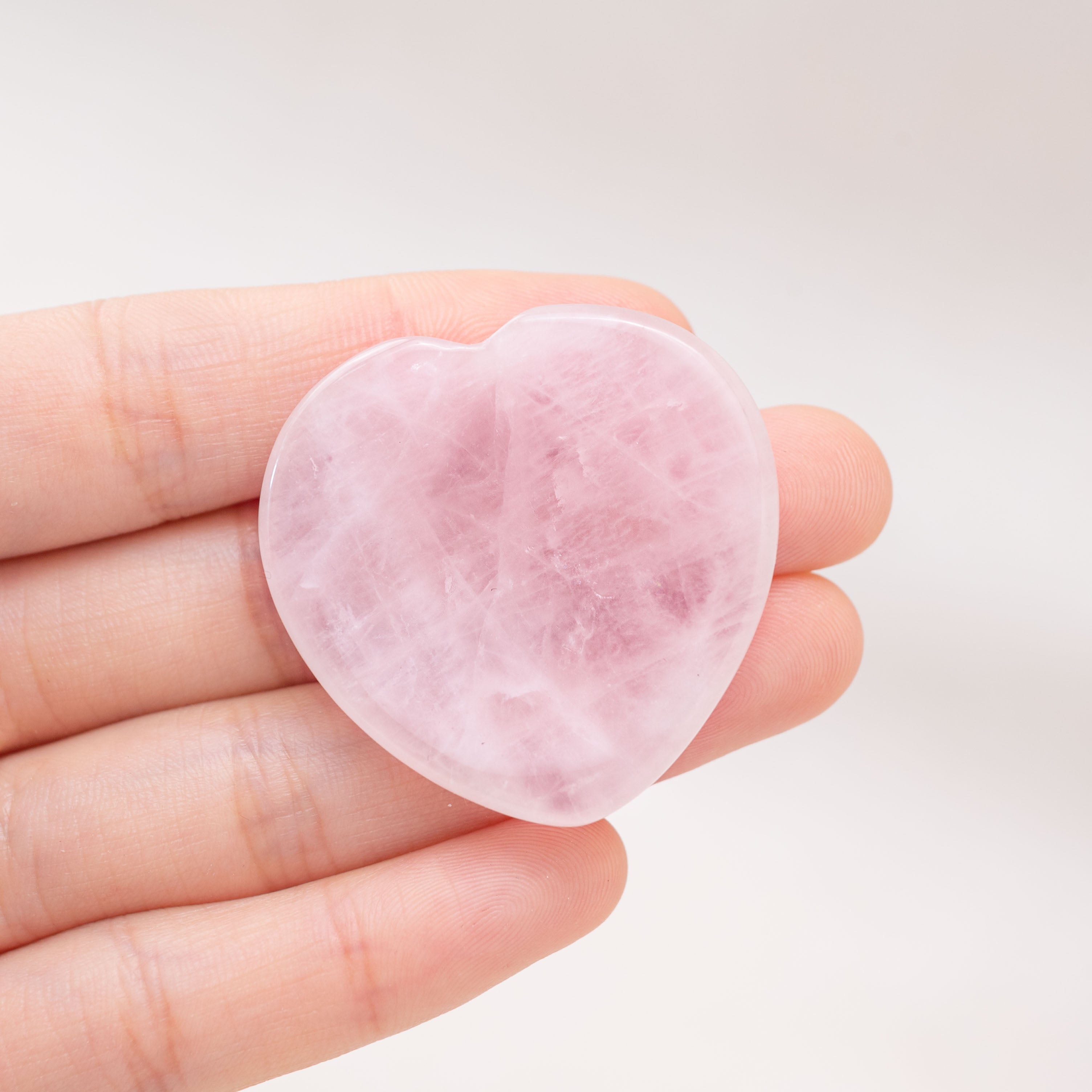 The Rose Quartz Heart Worry Stone enhances emotional clarity and balance