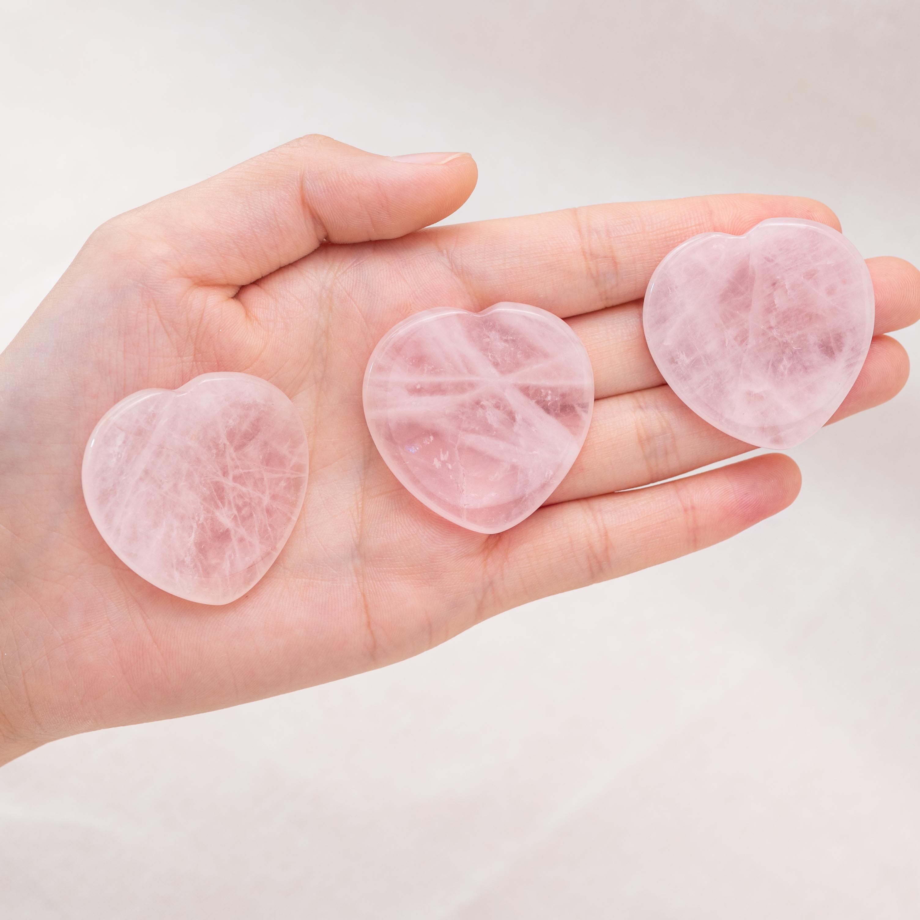 Experience the calming energy of the Rose Quartz Heart Worry Stone