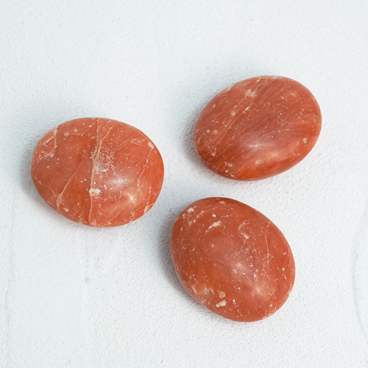 Smooth red selenite bar, ideal for root chakra alignment and grounding