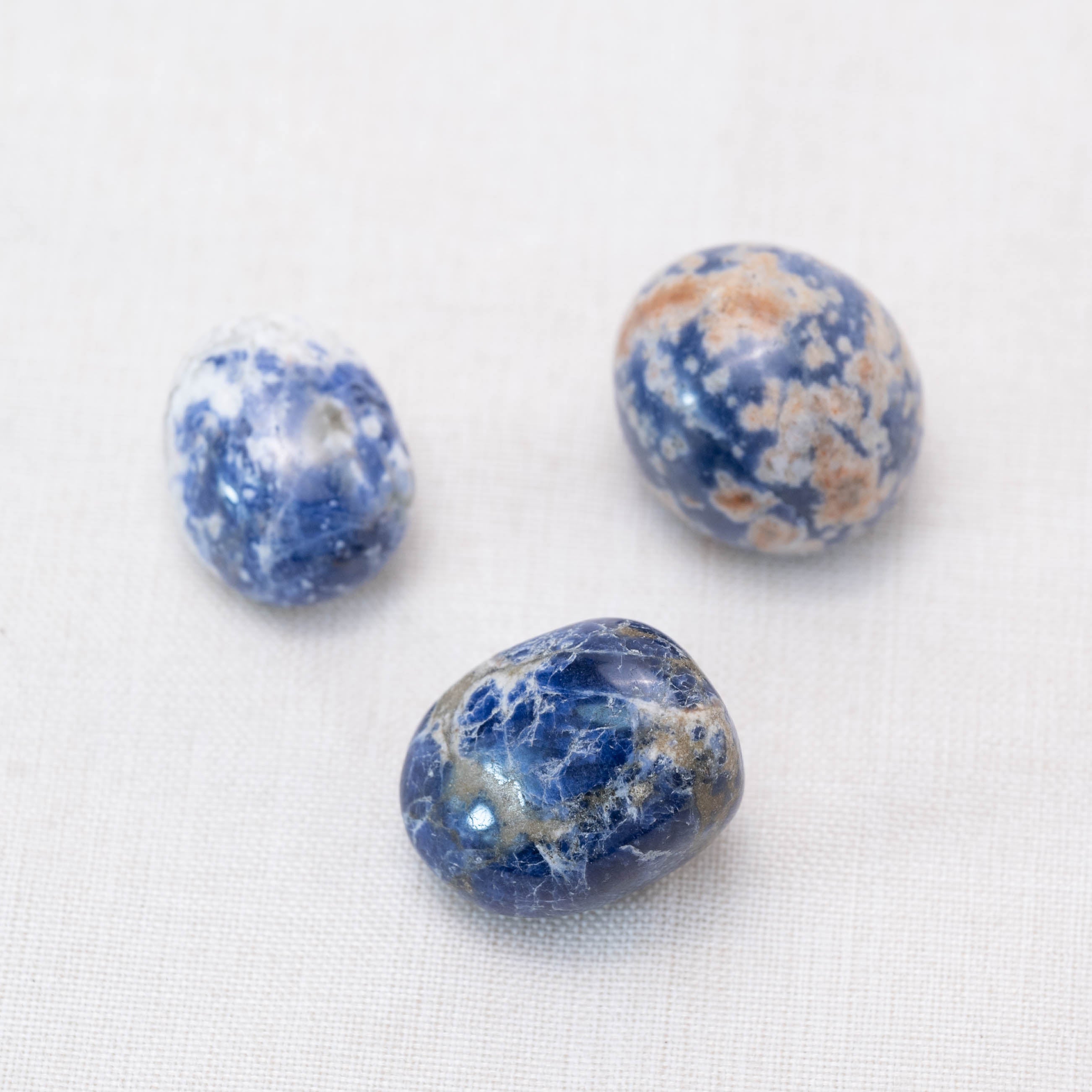 Displayed Sodalite tumbled stones for rational thought