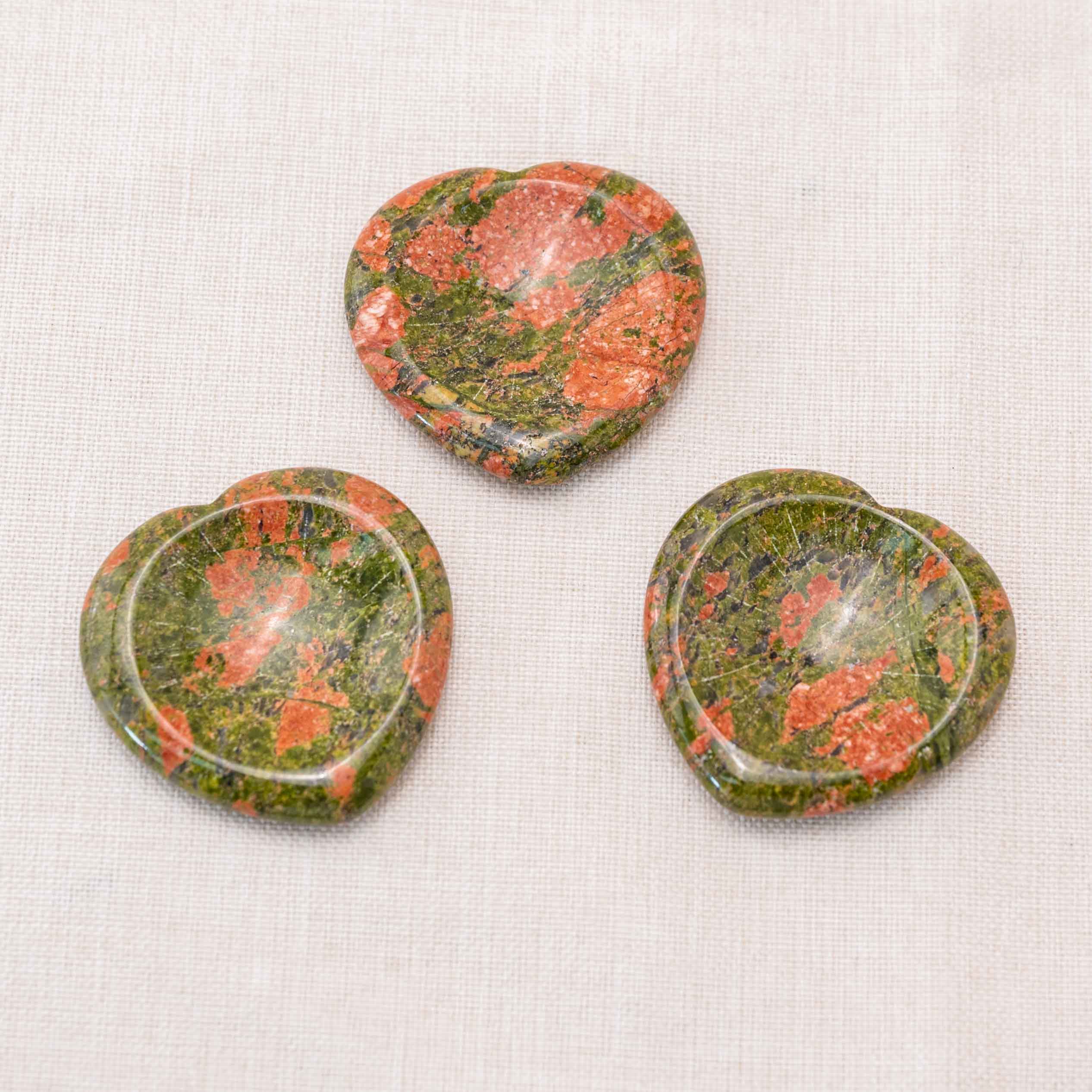 Experience the grounding energy of the Unakite Heart Worry Stone throughout the day