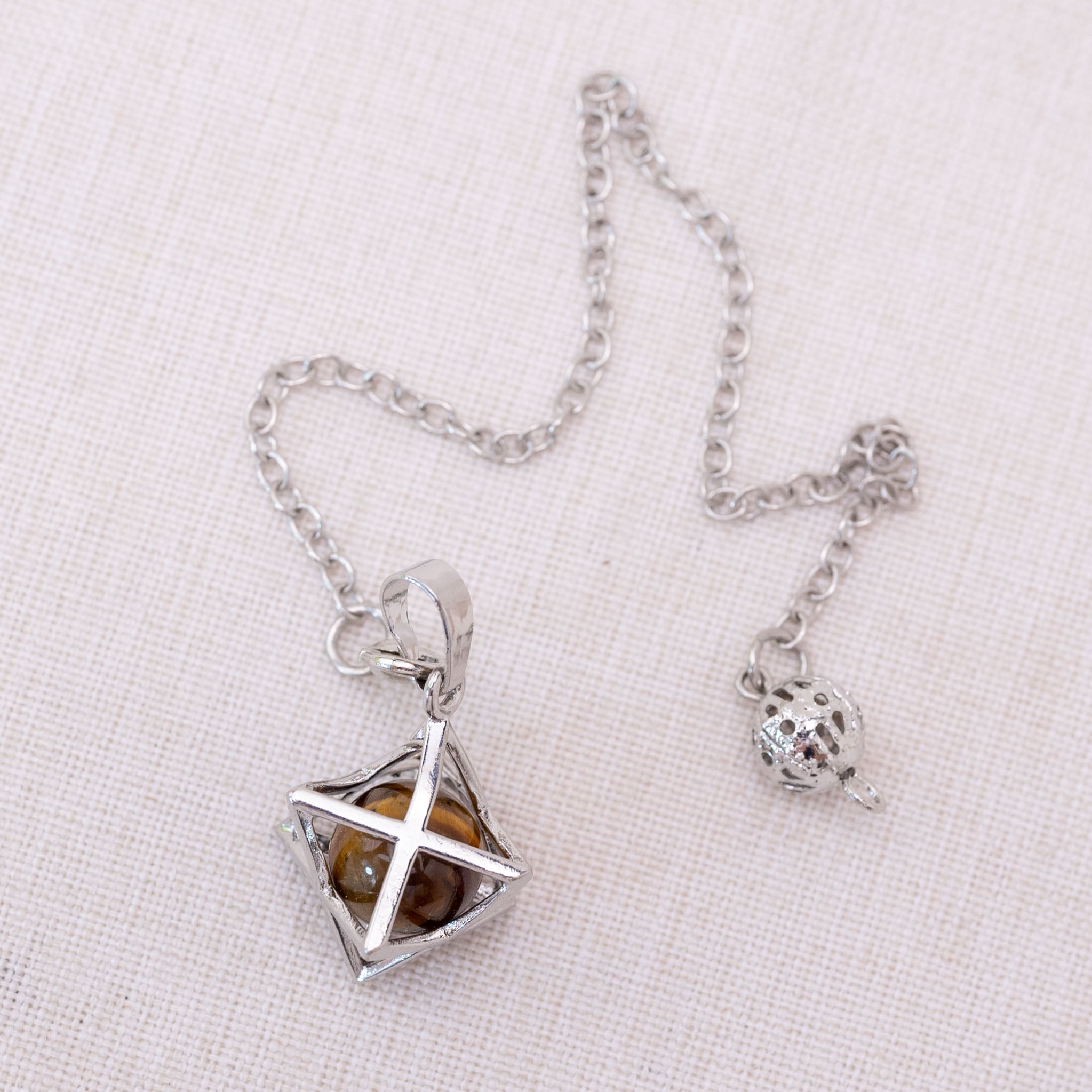 Tiger Eye Merkaba pendulum balancing energy